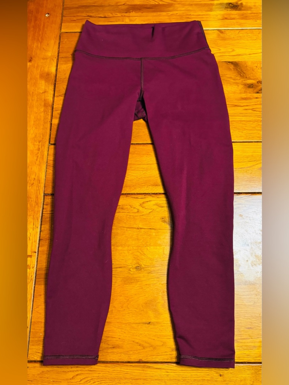 Fabletics PowerHold High-Waist Leggings in Burgundy.
